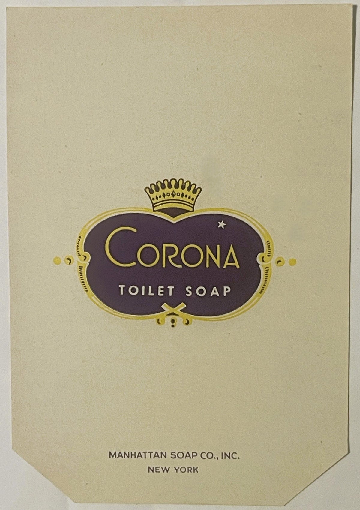 The Corona Toilet Soap label on cream paper with clipped bottom corners, purple and gold cartouche with a small white star