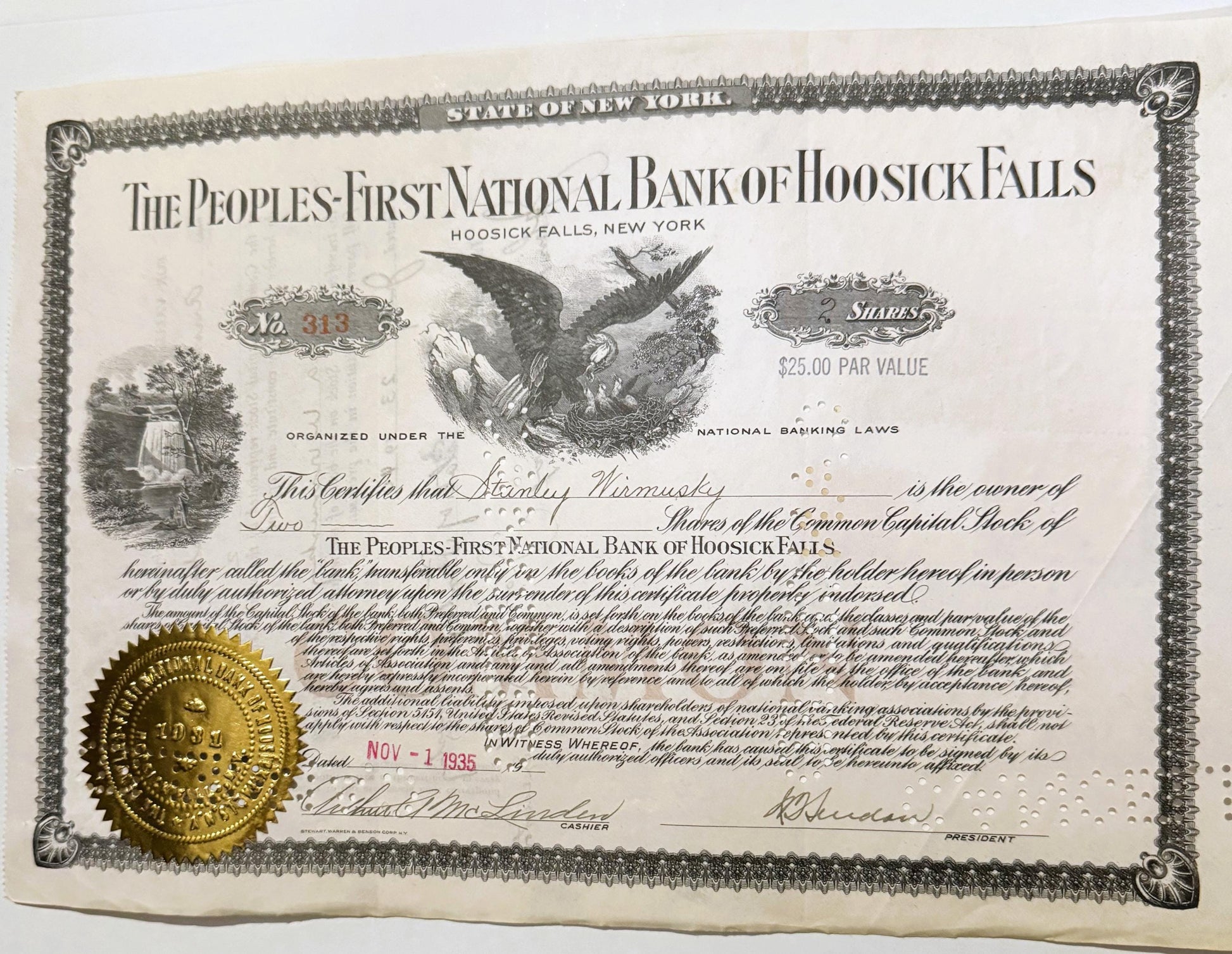 Vintage stock certificate from Peoples-First National Bank of Hoosick Falls, NY, featuring an eagle emblem, ornate borde