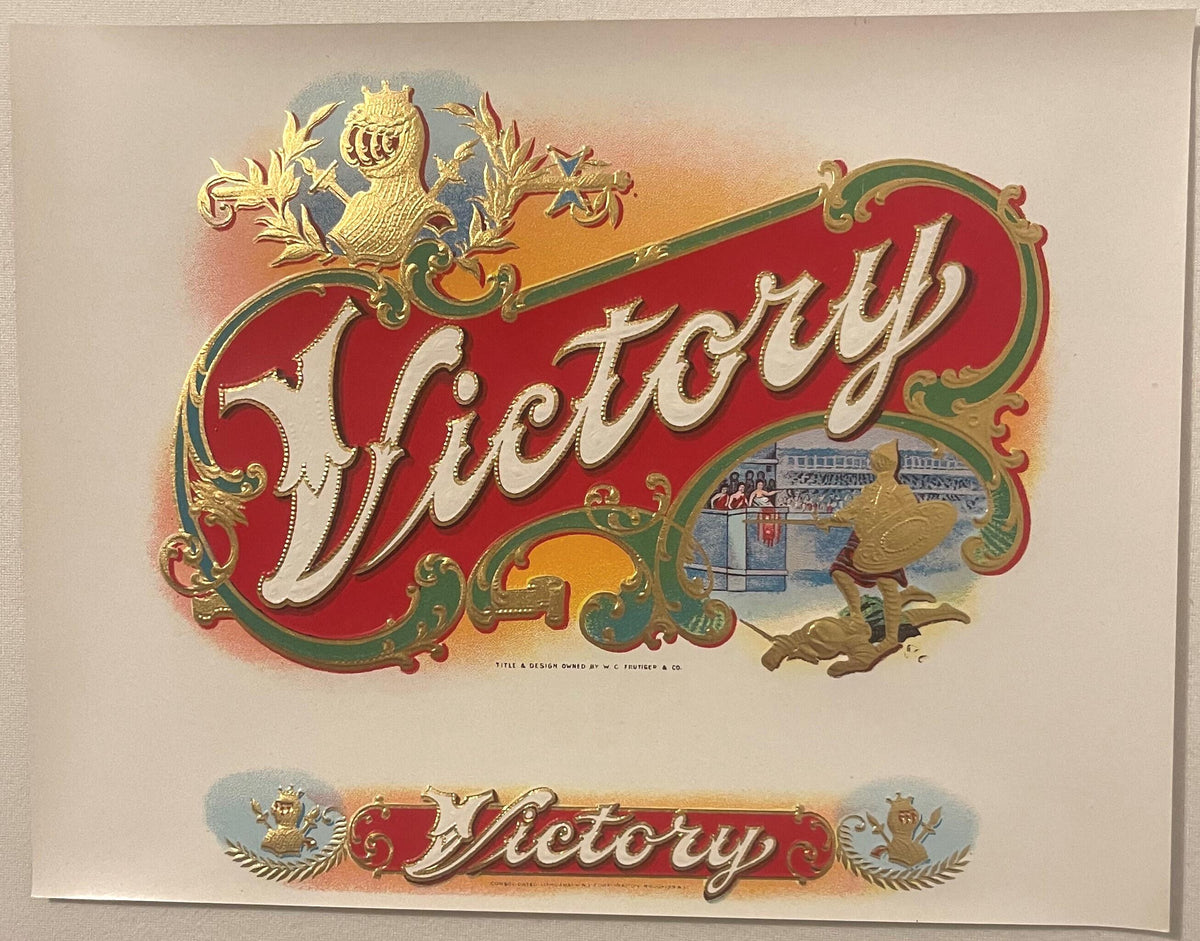 Antique Victory cigar label with ornate red and gold design, embossed lion crest, classical architecture vignette, and "Victo