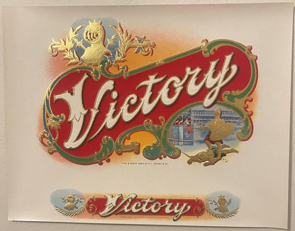 Antique Victory cigar label with ornate red and gold design, embossed lion crest, classical architecture vignette, and "Victo