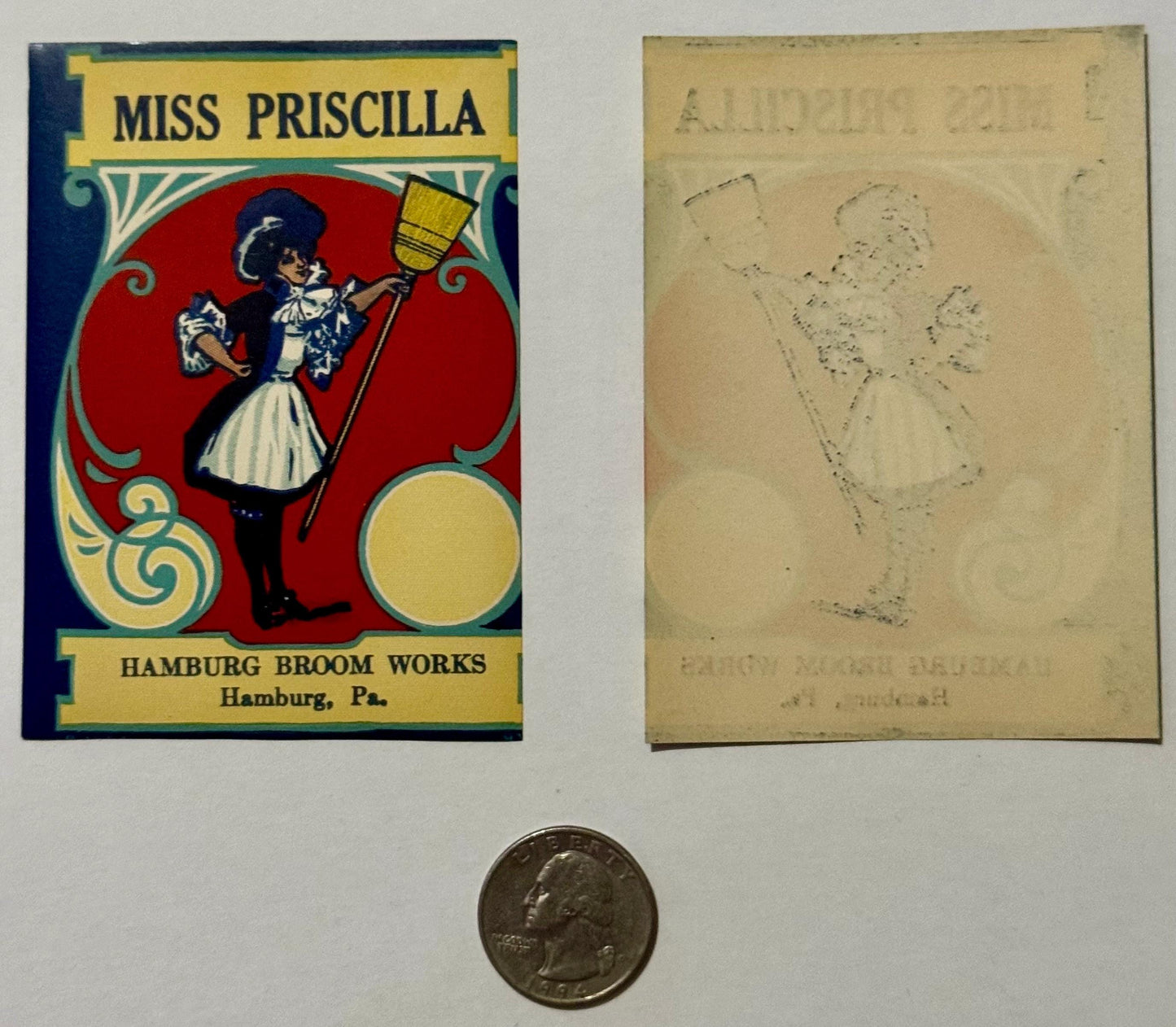 Vintage broom label showing stylized maid figure in blue and white holding yellow broom on red background.