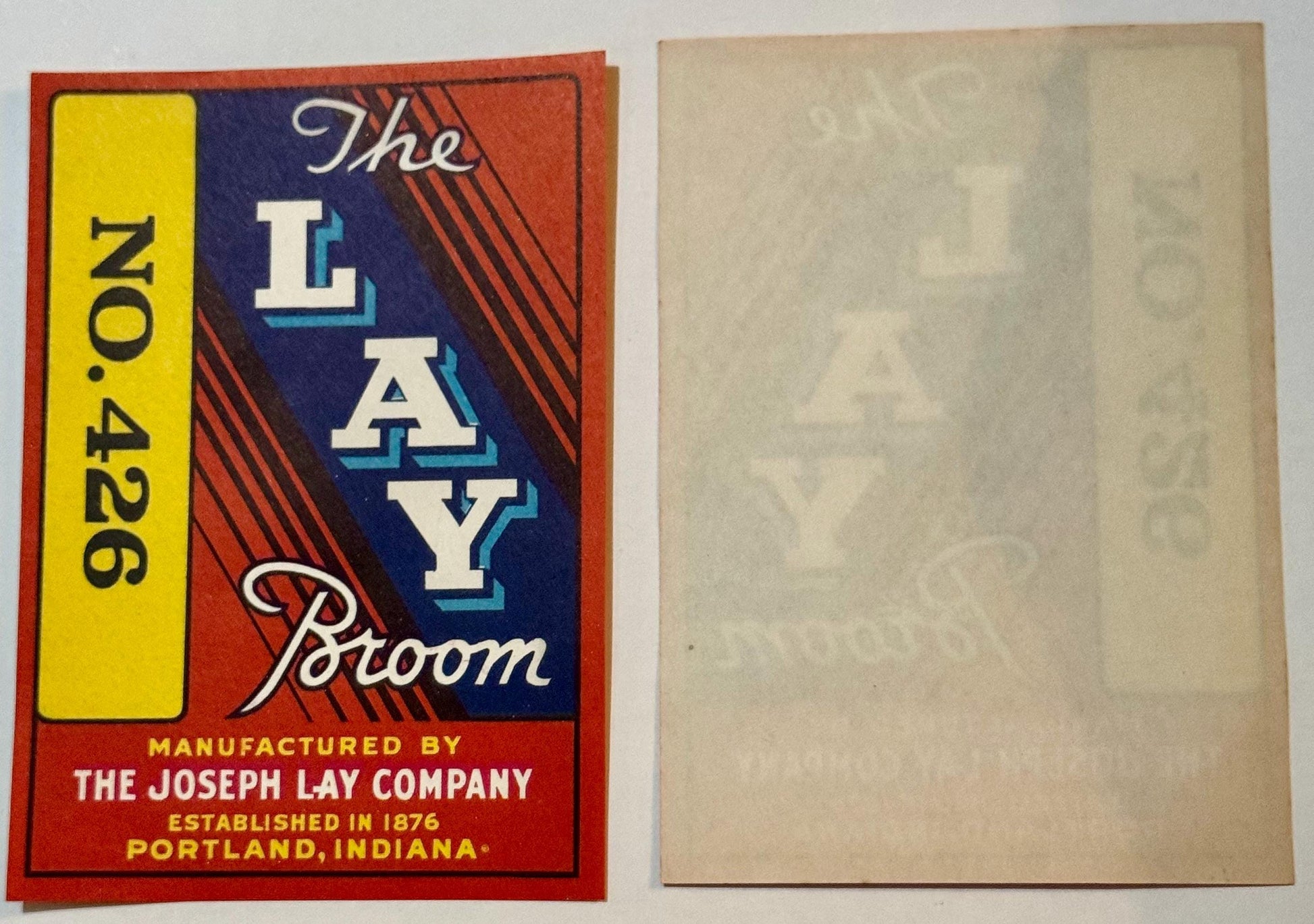 Front and back of "The Lay Broom No. 426" label, red, blue, yellow colors.