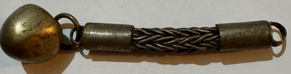 Antique brass foxtail chain with spherical dome pendant and loop connectors.