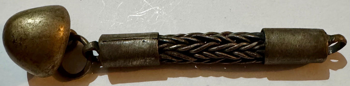 Antique brass foxtail chain fob with spherical dome terminal and cylindrical end caps.