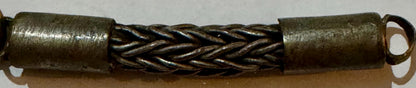 Antique brass foxtail chain with looped cylindrical ends and twisted braided metal center section.