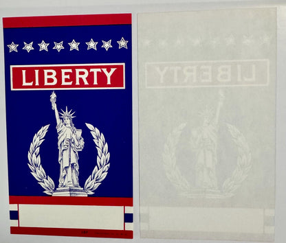 Vintage broom label with red, white and blue patriotic design featuring Statue of Liberty, stars, laurel wreath, and "LIBERTY