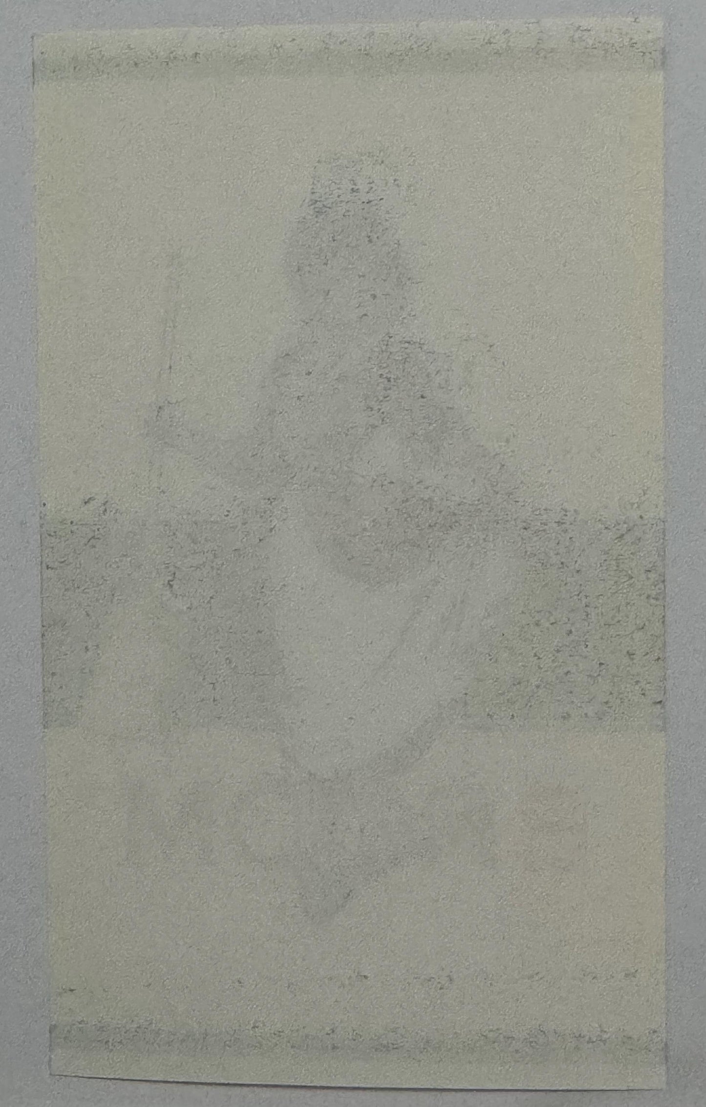 Cream-colored vintage broom label with faded lithographic printing and scattered dark spots, shown flat against gray backgrou