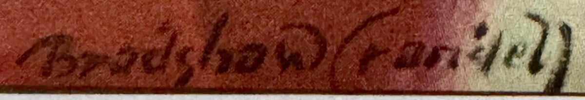 Close-up of vintage lithograph edge showing embossed text on red and cream colored paper with wear visible along the border