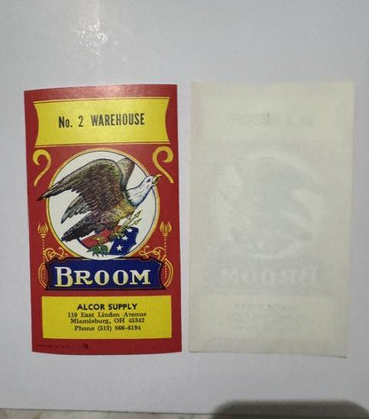 Front and blank back of the Alcor Supply broom label side by side