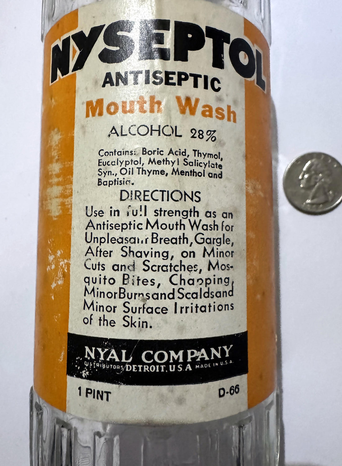 Nyseptol label up close: Antiseptic Mouth Wash, Alcohol 28%, the ingredient list, directions and Nyal Company, Distributors, Detroit, U.S.A.