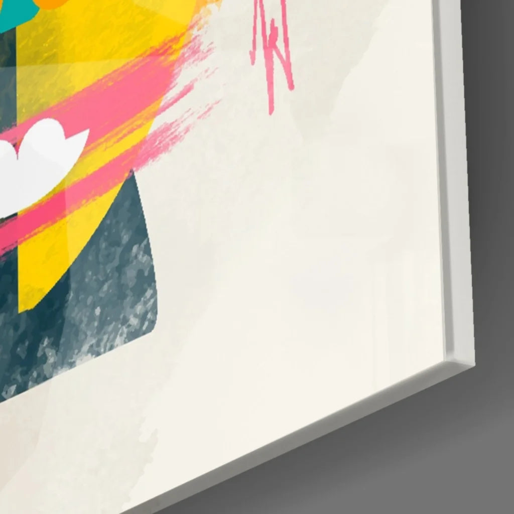 Vibrant bold geometric face glass wall art with yellow, pink, teal brushstrokes in white frame