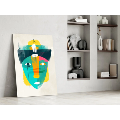 Vibrant abstract face glass wall art with teal, yellow, orange shapes on cream