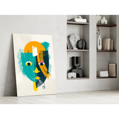 Bold geometric face glass wall art in vibrant teal and orange