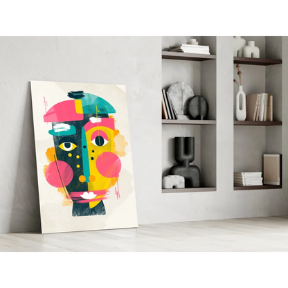 Vibrant geometric face glass wall art in bold pink, teal, yellow, black