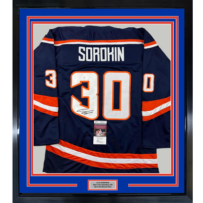 Framed navy blue hockey jersey with number 30 and "SOROKIN" name plate, signed, displayed flat against blue matting with red and white borders and authentication certificate visible at bottom.