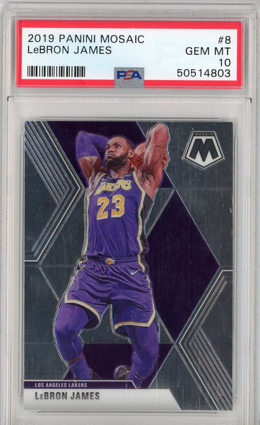 PSA-graded card in clear case showing LeBron James in purple Lakers jersey taking a jump shot against dark geometric background.