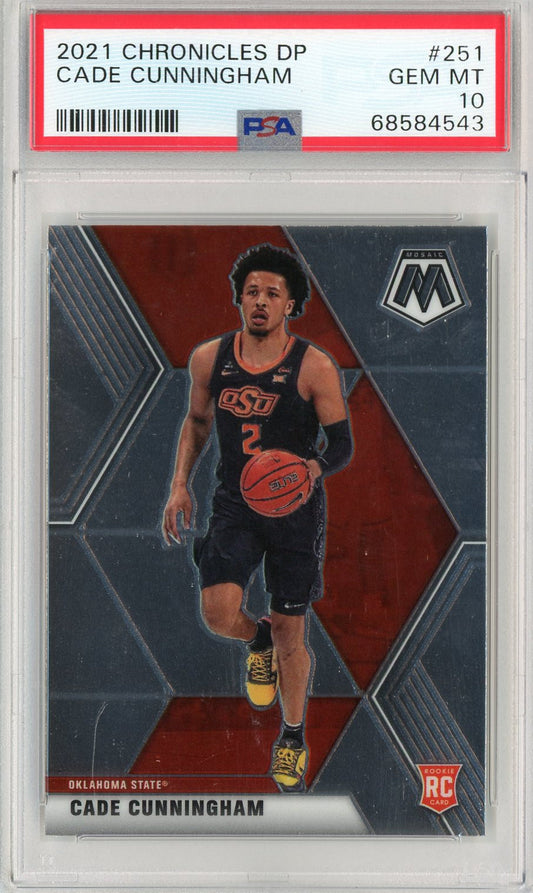 PSA-graded trading card in clear plastic holder showing Cade Cunningham in black Oklahoma State uniform dribbling basketball against red and dark geometric background.