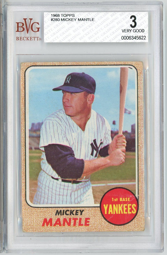 Graded 1968 Topps Mickey Mantle baseball card showing player in Yankees uniform holding bat, with gold textured border and team logo.