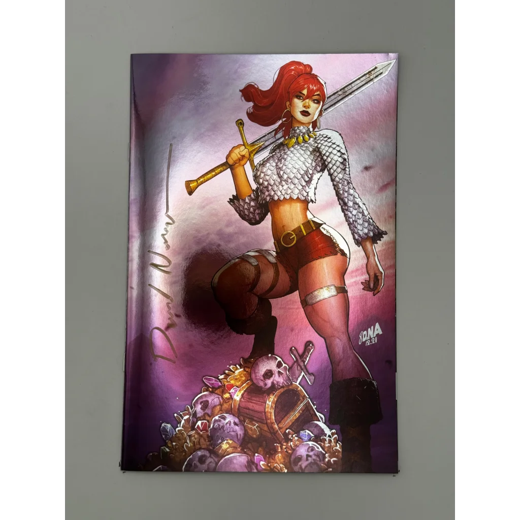 Immortal Red Sonja comic art print with female warrior on skulls and treasure display