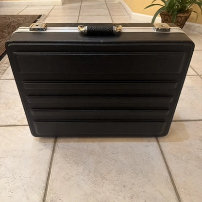 Black hard-shell PLATT case with gold latches for machine vision camera control unit