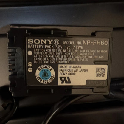 Black Sony NP-FH60 battery in machine vision camera control unit case