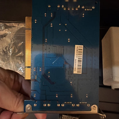 Blue PCB with gold PCIe in machine vision camera control unit, m2380mbr1 label