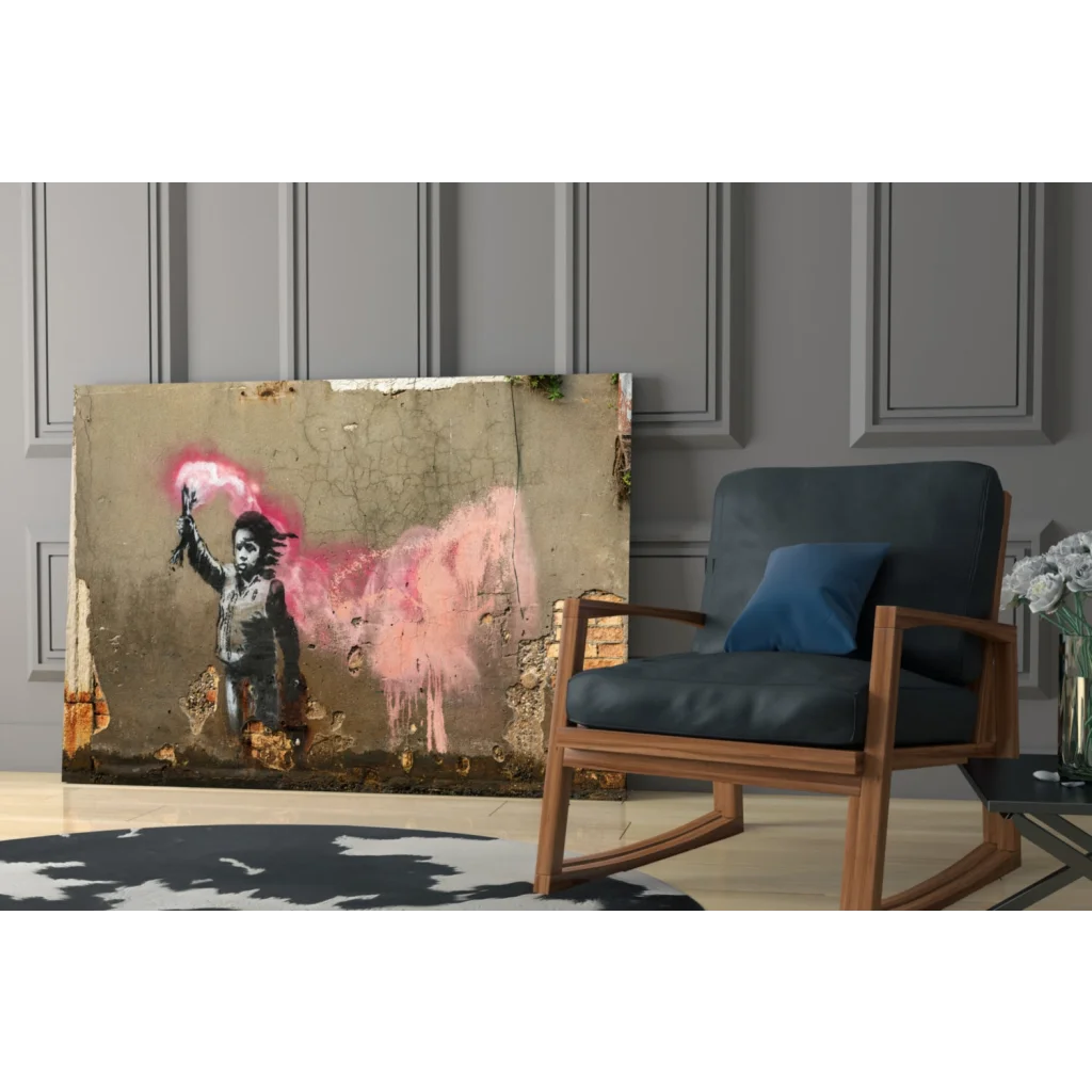 Banksy-style wall art canvas of child with pink spray paint on concrete