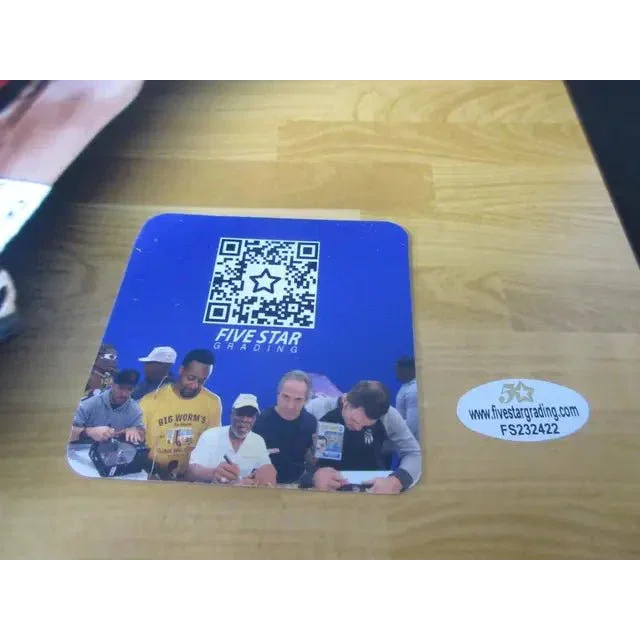 Blue coaster with people images and QR code for Isaac Okoro signed 16x20 photo