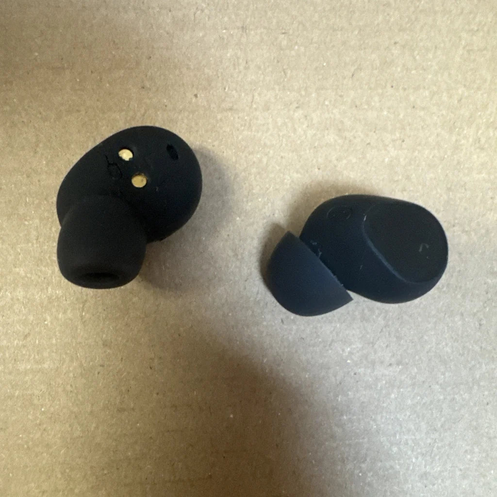 Jabra Elite 10 Titanium Black earbuds with matte finish and gold contacts for parts
