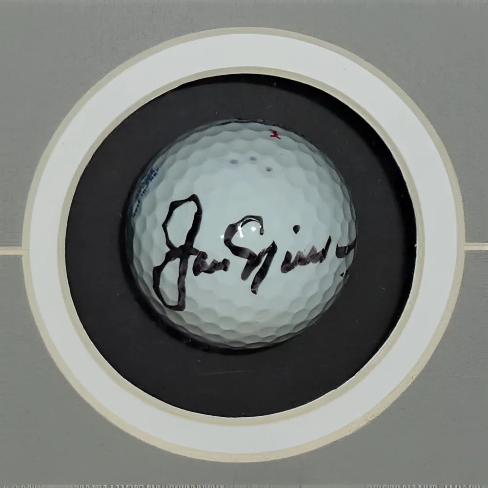 Autographed golf ball by Jack Nicklaus, Arnold Palmer, Gary Player in frame