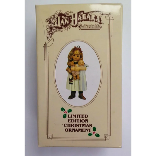 Rare 1984 Jan Hagara Christmas ornament of tan girl holding animal