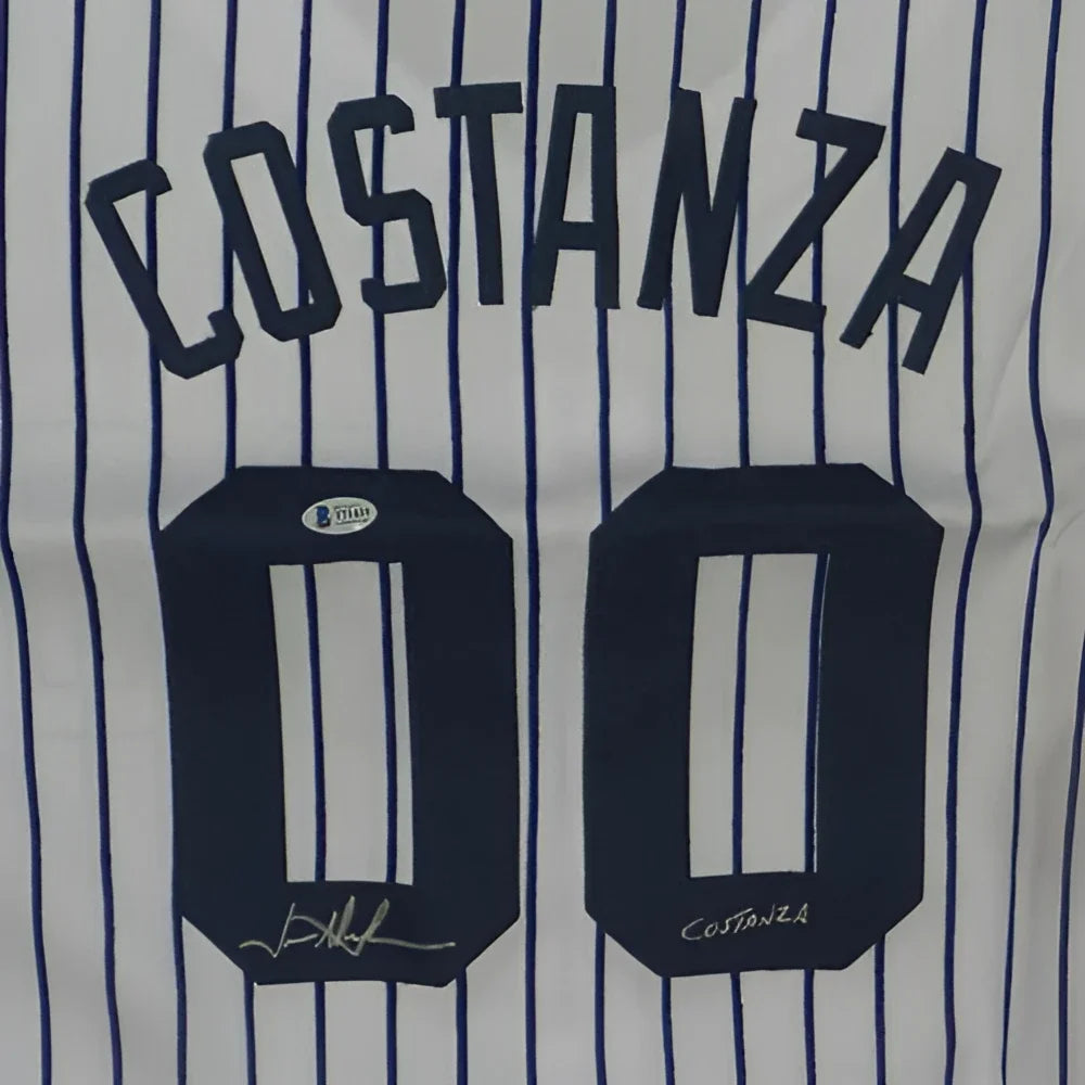 Back of white custom pinstripe baseball jersey with navy blue stripes featuring george costanza 00 and jason alexander autograph