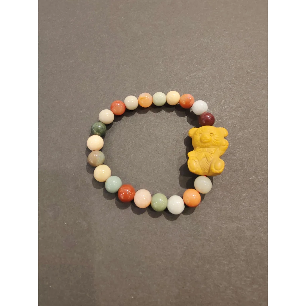 Jasper multi-color bead bracelet with yellow bear animal charm