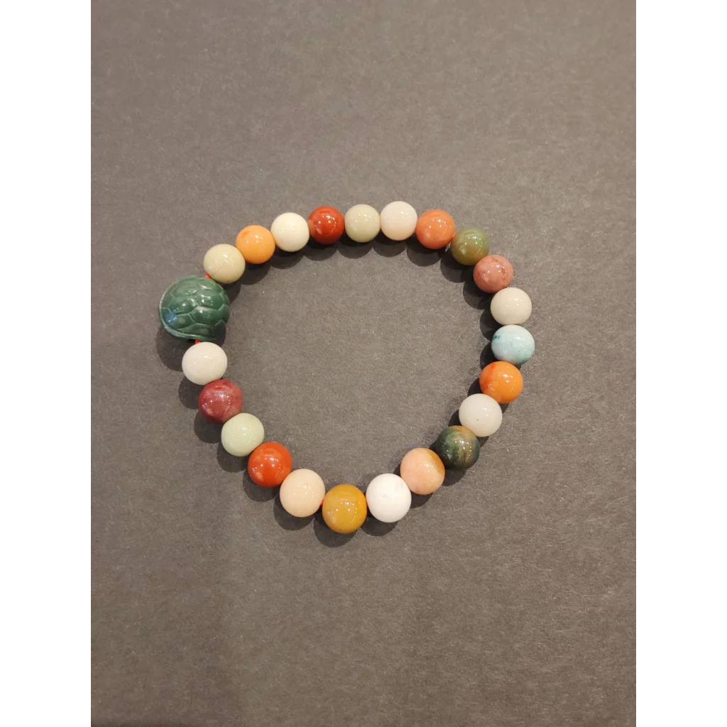 Jasper bead bracelet with multi-color stones and animal charm