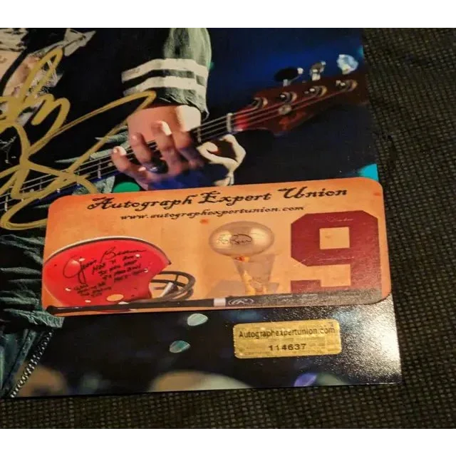 Jay DeMarcus auto signed 8x10 photo with certificate of authenticity featuring football helmet and trophy design