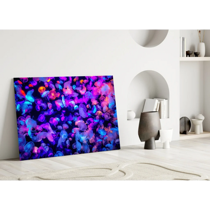 Glowing bioluminescent jellyfish glass wall art with vibrant purple blue pink swarm