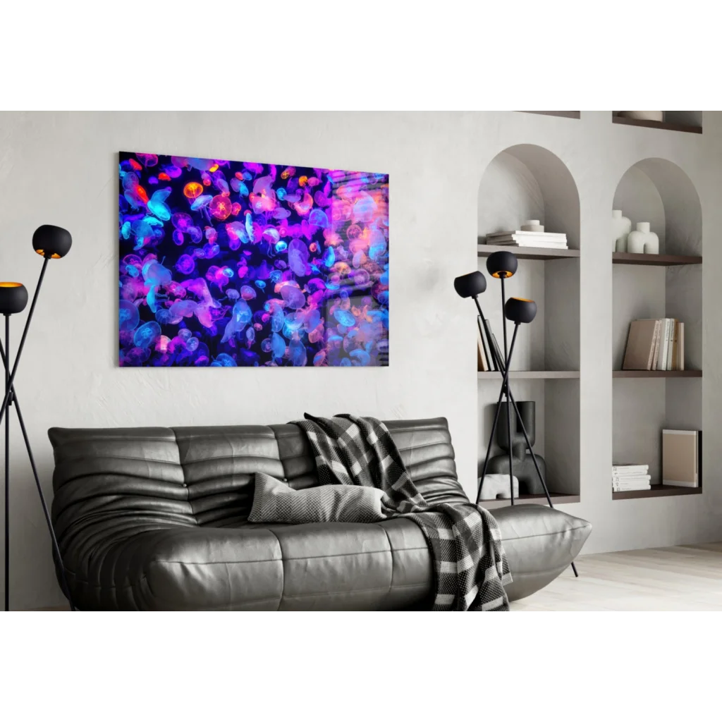 Vibrant purple and blue glowing bioluminescent jellyfish glass wall art on white wall