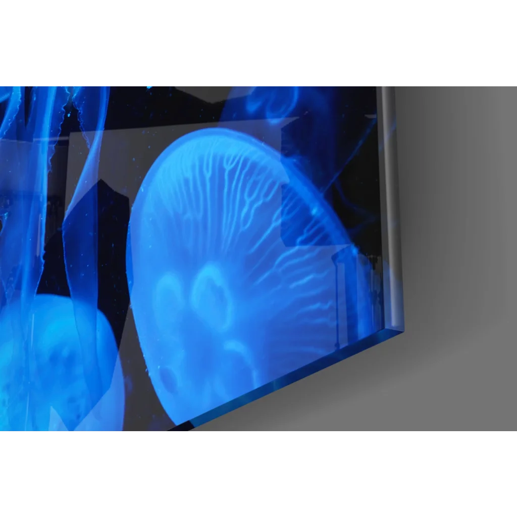 Glowing blue jellyfish in glass wall art print
