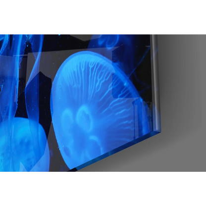 Glowing blue jellyfish in glass wall art print