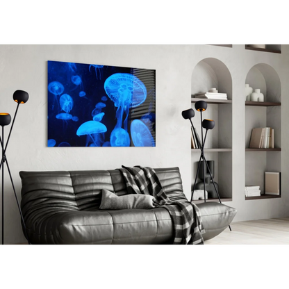 Glowing blue jellyfish wall art canvas print on glass wall