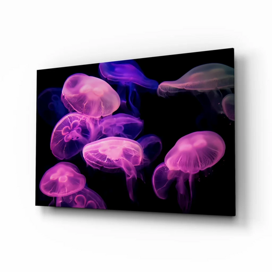 Glowing pink purple jellyfish glass wall art on black background