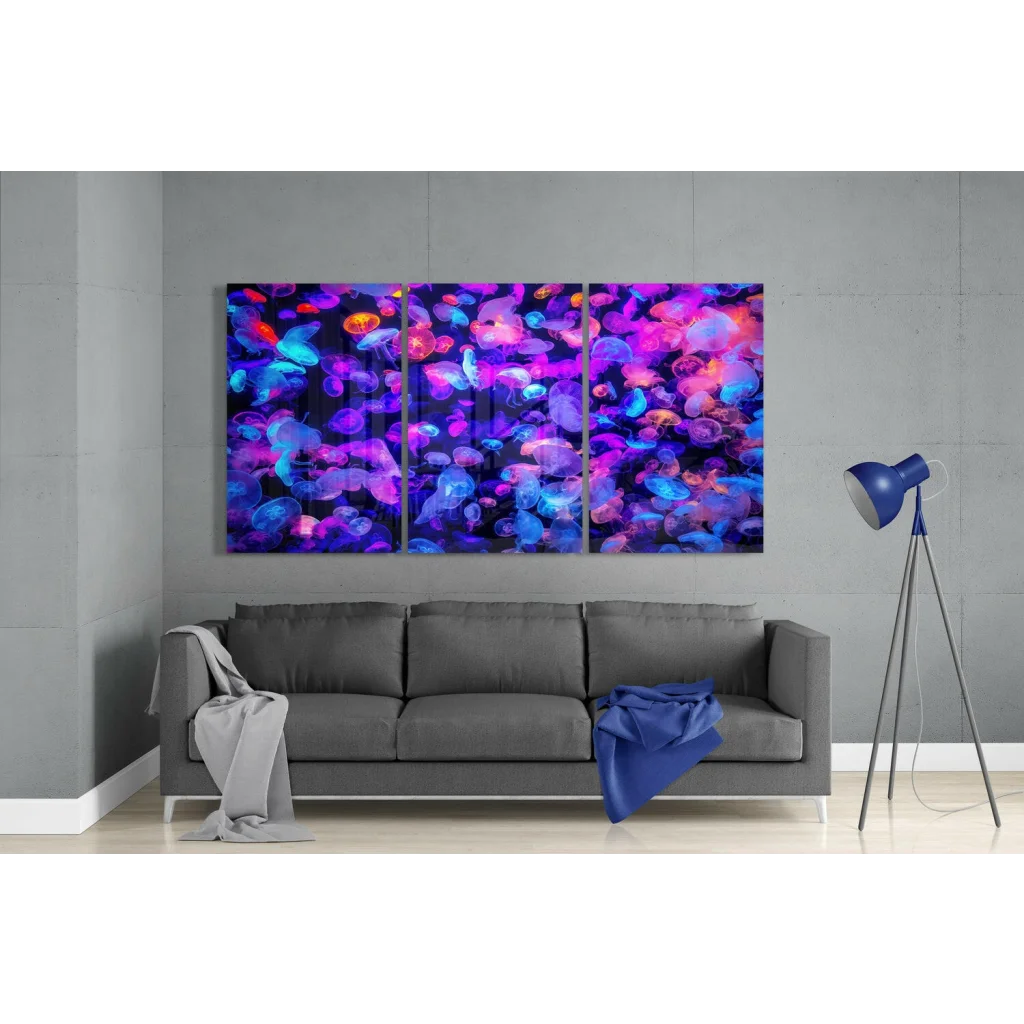 Glowing jellyfish triptych canvas wall art in neon purple blue pink