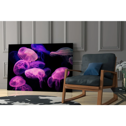 Vibrant purple pink glowing jellyfish glass wall art on black canvas