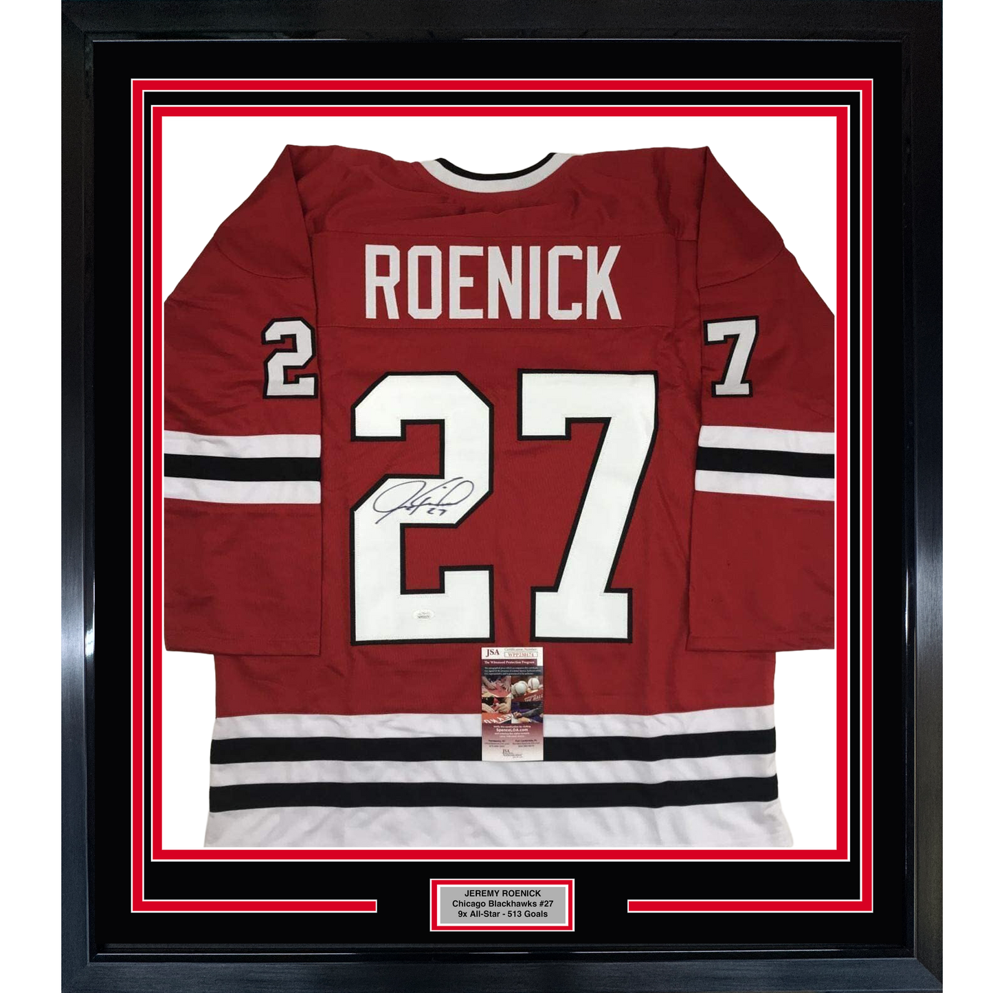 Framed red Chicago Blackhawks hockey jersey number 27 with "ROENICK" nameplate and autographed signature, displayed flat against white matting with black border frame.