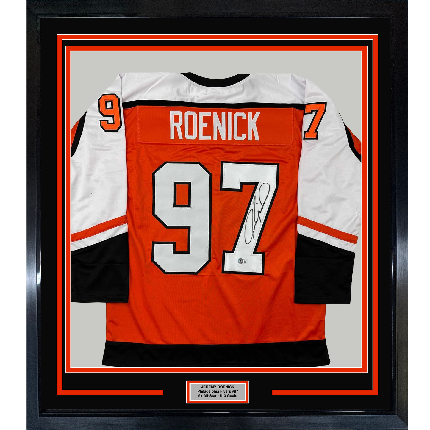 Framed Philadelphia Flyers orange hockey jersey #97 signed by Jeremy Roenick, displayed front-facing with authentication plaque.