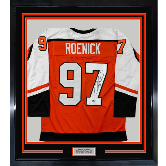 Framed Philadelphia Flyers orange hockey jersey #97 signed by Jeremy Roenick, displayed front-facing with authentication plaque.