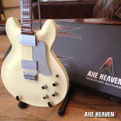 Cream-colored Jerry Garcia Axe Heaven® miniature guitar replica on adjustable A-frame stand