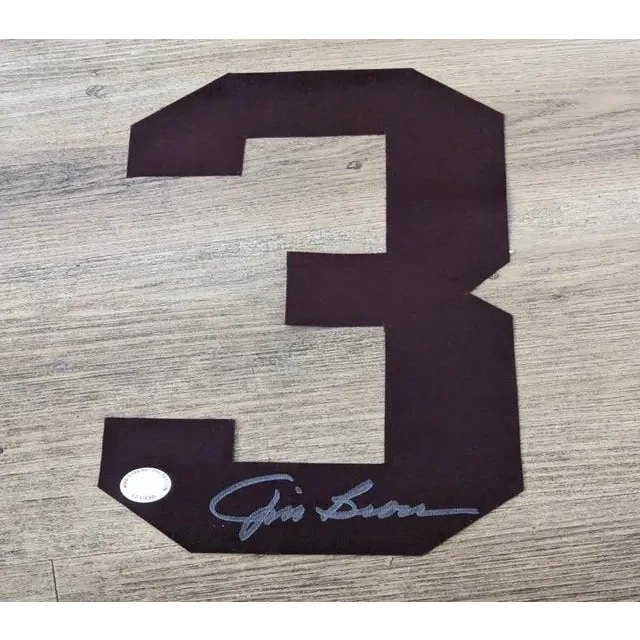 Dark brown Jim Brown autographed number 3 jersey patch with autograph and certificate