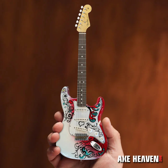 Mini white and red Jimi Hendrix electric guitar with floral designs by Axe Heaven