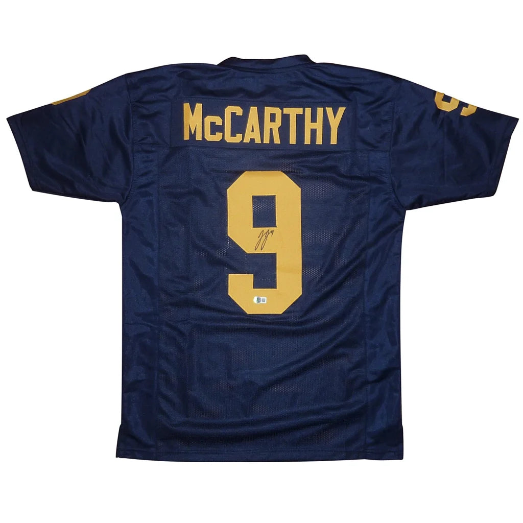 Autographed Michigan Wolverines JJ McCarthy blue jersey #9